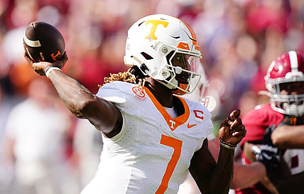 Oct 21, 2023; Tuscaloosa, Alabama, USA; Tennessee Volunteers quarterback Joe Milton III (7) passing against the Alabama Crimson Tide during the first half at Bryant-Denny Stadium. Mandatory Credit: John David Mercer-USA TODAY Sports