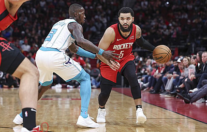 Nov 1, 2023; Houston, Texas, USA; Houston Rockets guard Fred VanVleet (5) controls the ball as Charlotte Hornets guard Terry Rozier (3) defends during the third quarter at Toyota Center. Mandatory Credit: Troy Taormina-USA TODAY Sports