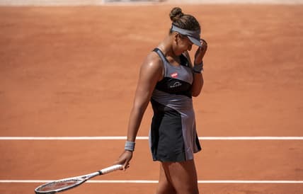 May 30, 2021; Paris, France; Naomi Osaka (JPN) celebrates matchpoint during her match against Patricia Maria Tig (ROU) at Roland Garros Stadium. Mandatory Credit: Susan Mullane-USA TODAY Sports