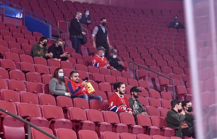 Sep 27, 2021; Montreal, Quebec, CAN; Some of the 7500 fans allowed in look on during the warmup period before a game between the Toronto Maple Leafs and the Montreal Canadiens at the Bell Centre. Mandatory Credit: Eric Bolte-USA TODAY Sports