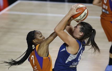 Sep 17, 2020; Palmetto, Florida, USA; Phoenix Mercury guard Shatori Walker-Kimbrough (2) guards Minnesota Lynx guard Bridget Carleton (6) during the first half at the FELD entertainment complex. Mandatory Credit: Reinhold Matay-USA TODAY Sports