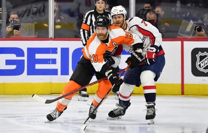 Feb 17, 2022; Philadelphia, Pennsylvania, USA; Philadelphia Flyers center Claude Giroux (28) and Washington Capitals defenseman Nick Jensen (3) at Wells Fargo Center. Mandatory Credit: Eric Hartline-USA TODAY Sports