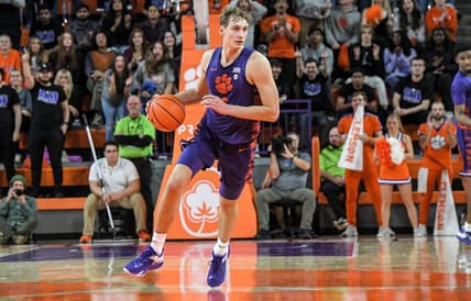 Jan 24, 2023; Clemson, South Carolina, USA; Clemson Tigers forward Hunter Tyson (5) moves the ball up court agianst the Georgia Tech Yellow Jackets during the second half at Littlejohn Coliseum. Mandatory Credit: Ken Ruinard-USA TODAY Sports