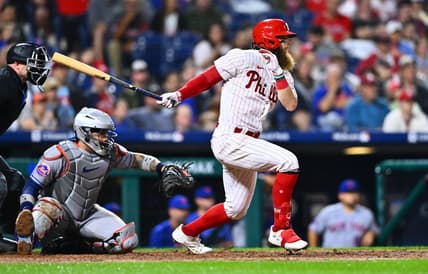Jun 23, 2023; Philadelphia, Pennsylvania, USA; Philadelphia Phillies outfielder Brandon Marsh (16) hits an infield single against the New York Mets in the eighth inning at Citizens Bank Park. Mandatory Credit: Kyle Ross-USA TODAY Sports