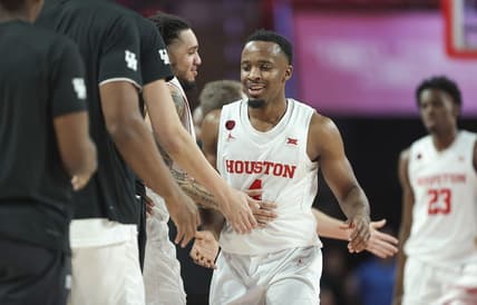 Dec 9, 2023; Houston, Texas, USA; Houston Cougars guard LJ Cryer (4) after a play during the first half against the Jackson State Tigers at Fertitta Center. Mandatory Credit: Troy Taormina-USA TODAY Sports