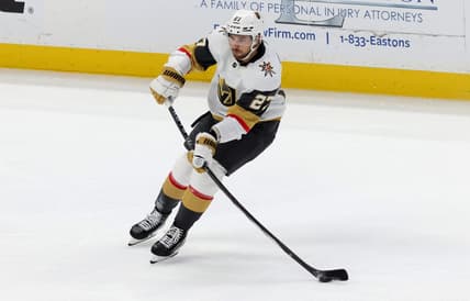 Nov 5, 2023; Anaheim, California, USA; Vegas Golden Knights defenseman Shea Theodore (27) passes during the third period against the Anaheim Ducks at Honda Center. Mandatory Credit: Jason Parkhurst-USA TODAY Sports