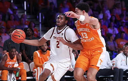 Nov 24, 2022; Paradise Island, BAHAMAS; USC Trojans guard Reese Dixon-Waters (2) drives to the basket as Tennessee Volunteers forward Olivier Nkamhoua (13) defends during the first half at Imperial Arena. Mandatory Credit: Kevin Jairaj-USA TODAY Sports