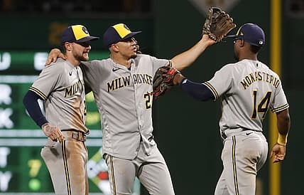 Sep 5, 2023; Pittsburgh, Pennsylvania, USA; Milwaukee Brewers second baseman Brice Turang (2) and shortstop Willy Adames (27) and third baseman Andruw Monasterio (14) celebrate after defeating the Pittsburgh Pirates at PNC Park. The Brewers won 7-3. Mandatory Credit: Charles LeClaire-USA TODAY Sports