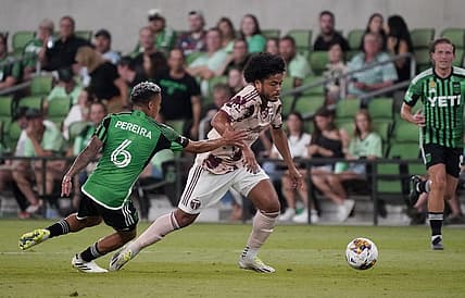 Sep 17, 2023; Austin, Texas, USA; Portland Timbers midfielder Evander (20) dribbles against Austin FC midfielder Daniel Pereira (6) during the second half at Q2 Stadium. Mandatory Credit: Scott Wachter-USA TODAY Sports