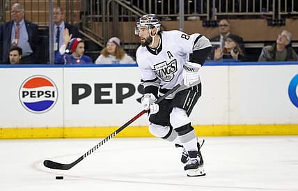 Dec 10, 2023; New York, New York, USA; Los Angeles Kings defenseman Drew Doughty (8) looks to pass against the New York Rangers during the third period at Madison Square Garden. Mandatory Credit: Danny Wild-USA TODAY Sports
