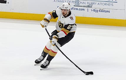 Nov 5, 2023; Anaheim, California, USA; Vegas Golden Knights defenseman Shea Theodore (27) passes during the third period against the Anaheim Ducks at Honda Center. Mandatory Credit: Jason Parkhurst-USA TODAY Sports
