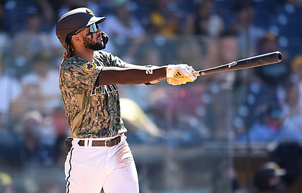 May 23, 2021; San Diego, California, USA; San Diego Padres shortstop Fernando Tatis Jr. (23) watches his grand slam home run against the Seattle Mariners during the seventh inning at Petco Park. Mandatory Credit: Orlando Ramirez-USA TODAY Sports