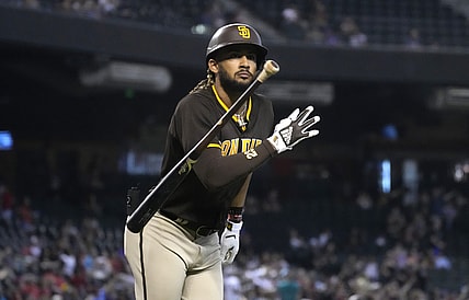 Aug 15, 2021; Phoenix, Arizona, USA; San Diego Padres right fielder Fernando Tatis Jr. (23) tosses his bat after hitting a solo home run against the Arizona Diamondbacks in the first inning at Chase Field. Mandatory Credit: Rick Scuteri-USA TODAY Sports