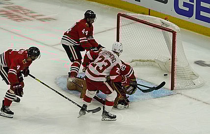 Oct 24, 2021; Chicago, Illinois, USA; Detroit Red Wings right wing Lucas Raymond (23)  scores a goal against the Chicago Blackhawks during the first period at United Center. Mandatory Credit: David Banks-USA TODAY Sports