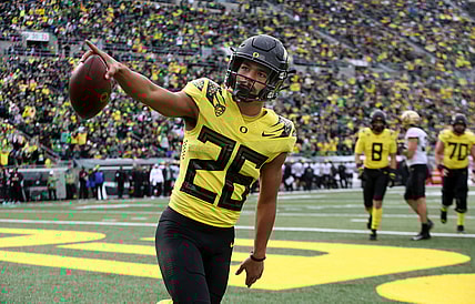 Oregon running back Travis Dye celebrates his second quarter touchdown against Colorado Saturday Oct. 30, 2021.

Eug 103021 Uo Cofb16