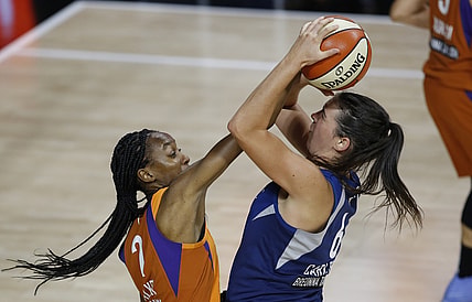 Sep 17, 2020; Palmetto, Florida, USA; Phoenix Mercury guard Shatori Walker-Kimbrough (2) guards Minnesota Lynx guard Bridget Carleton (6) during the first half at the FELD entertainment complex. Mandatory Credit: Reinhold Matay-USA TODAY Sports
