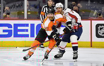 Feb 17, 2022; Philadelphia, Pennsylvania, USA; Philadelphia Flyers center Claude Giroux (28) and Washington Capitals defenseman Nick Jensen (3) at Wells Fargo Center. Mandatory Credit: Eric Hartline-USA TODAY Sports