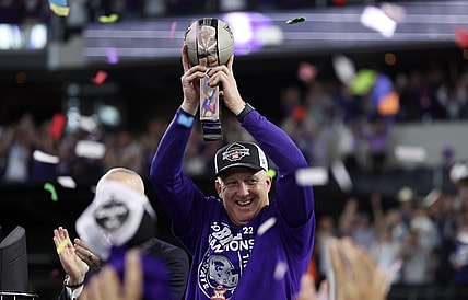 Dec 3, 2022; Arlington, TX, USA;  Kansas State Wildcats head coach Chris Klieman holds up the Big 12 Championship trophy after the game against the TCU Horned Frogs at AT&T Stadium. Mandatory Credit: Kevin Jairaj-USA TODAY Sports