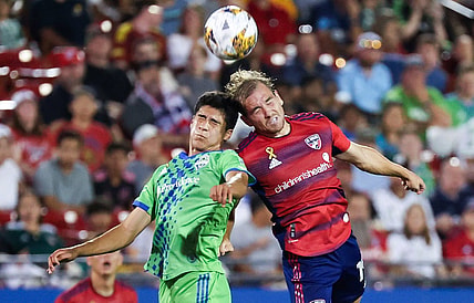 Sep 16, 2023; Frisco, Texas, USA;  Seattle Sounders forward Jordan Morris (13) and FC Dallas midfielder Paxton Pomykal (19) go for the ball during the first half at Toyota Stadium. Mandatory Credit: Kevin Jairaj-USA TODAY Sports