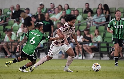 Sep 17, 2023; Austin, Texas, USA; Portland Timbers midfielder Evander (20) dribbles against Austin FC midfielder Daniel Pereira (6) during the second half at Q2 Stadium. Mandatory Credit: Scott Wachter-USA TODAY Sports