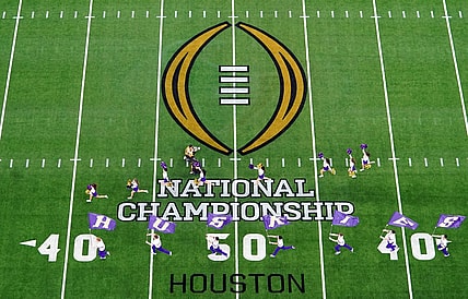 Jan 8, 2024; Houston, TX, USA; A general view as the Washington Huskies take the field before to the 2024 College Football Playoff national championship game at NRG Stadium. Mandatory Credit: James Lang-USA TODAY Sports