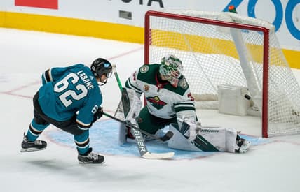 Mar 29, 2021; San Jose, California, USA; San Jose Sharks right wing Kevin Labanc (62) scores against Minnesota Wild goaltender Cam Talbot (33) during the shootout at SAP Center at San Jose. Mandatory Credit: Neville E. Guard-USA TODAY Sports