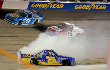 May 7, 2021; Darlington, Darlington, USA; NASCAR Truck Series driver Timothy Peters (25) spins during the LiftKits4Less.com 200 at Darlington Raceway. Mandatory Credit: Jasen Vinlove-USA TODAY Sports