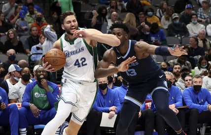 Jan 23, 2022; Dallas, Texas, USA; Dallas Mavericks forward Maxi Kleber (42) elbows Memphis Grizzlies forward Jaren Jackson Jr. (13) in te nose during the second half at American Airlines Center. Mandatory Credit: Kevin Jairaj-USA TODAY Sports