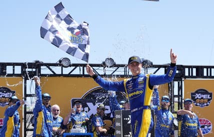 Mar 26, 2022; Austin, Texas, USA;  NASCAR Truck Series driver Zane Smith (38) reacts after winning the XPEL 225 at Circuit of the Americas. Mandatory Credit: Mike Dinovo-USA TODAY Sports