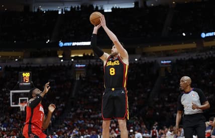 Apr 10, 2022; Houston, Texas, USA; Atlanta Hawks forward Danilo Gallinari (8) shoots the ball as Houston Rockets forward David Nwaba (2) defends during the fourth quarter at Toyota Center. Mandatory Credit: Troy Taormina-USA TODAY Sports