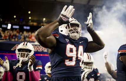 Oct 1, 2022; Tucson, Arizona, USA; Arizona Wildcats defensive lineman Dion Wilson Jr. (94) and the rest of his teammates walk out of the tunnel before facing the Colorado Buffaloes at Arizona Stadium. Mandatory Credit: Ivan Pierre Aguirre-USA TODAY Sports