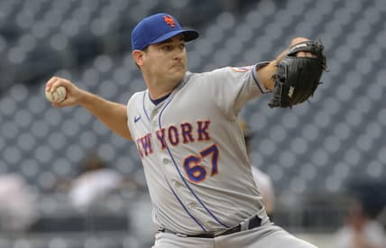Sep 7, 2022; Pittsburgh, Pennsylvania, USA;  New York Mets relief pitcher Seth Lugo (67) pitches against the Pittsburgh Pirates during the eighth inning at PNC Park. Mandatory Credit: Charles LeClaire-USA TODAY Sports