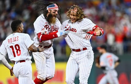 Jul 25, 2023; Philadelphia, Pennsylvania, USA; Philadelphia Phillies infielder Alec Bohm (28) celebrates with outfielder Brandon Marsh (16) after hitting a game-winning RBI single against the Baltimore Orioles in the ninth inning at Citizens Bank Park. Mandatory Credit: Kyle Ross-USA TODAY Sports