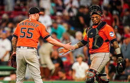 Aug 30, 2023; Boston, Massachusetts, USA; Houston Astros relief pitcher Ryan Pressly (55) and catcher Martin Maldonado (15) congratulate each other after defeating the Boston Red Sox at Fenway Park. Mandatory Credit: David Butler II-USA TODAY Sports