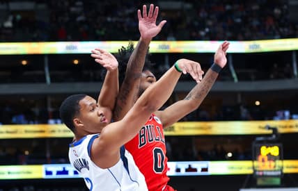 Nov 1, 2023; Dallas, Texas, USA;  Dallas Mavericks forward Grant Williams (3) shoots past Chicago Bulls guard Coby White (0) during the first quarter at American Airlines Center. Mandatory Credit: Kevin Jairaj-USA TODAY Sports