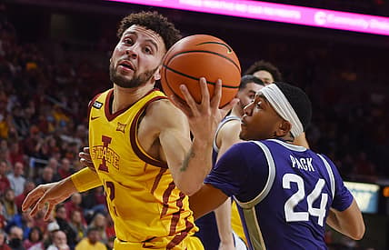 Iowa State Cyclones guard Gabe Kalscheur (22) rebounds the ball against Kansas State Wildcats guard Nijel Pack (24) during the second half at Hilton Coliseum, Saturday, Feb. 12, 2022, in Ames, Iowa.