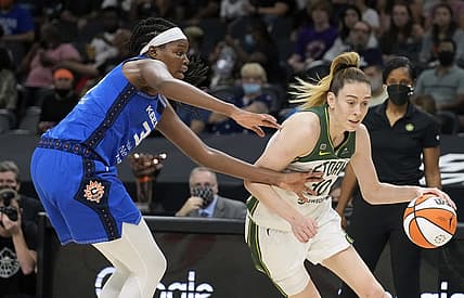 Aug 12, 2021; Phoenix, Arizona, USA; Seattle Storm forward Breanna Stewart (30) drives against Connecticut Sun forward Kaila Charles (left) in the first half during the Inaugural WNBA Commissioners Cup Championship Game at Footprint Center. Mandatory Credit: Rick Scuteri-USA TODAY Sports