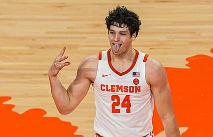 Clemson sophomore forward PJ Hall (24) reacts after making a three-point shot against Wake Forest during the second half at Littlejohn Coliseum Friday, December 2, 2022.

Clemson Basketball Vs Wake Forest University Acc