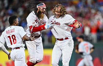 Jul 25, 2023; Philadelphia, Pennsylvania, USA; Philadelphia Phillies infielder Alec Bohm (28) celebrates with outfielder Brandon Marsh (16) after hitting a game-winning RBI single against the Baltimore Orioles in the ninth inning at Citizens Bank Park. Mandatory Credit: Kyle Ross-USA TODAY Sports