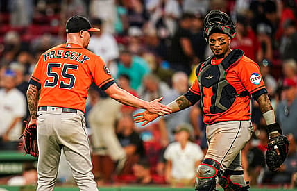 Aug 30, 2023; Boston, Massachusetts, USA; Houston Astros relief pitcher Ryan Pressly (55) and catcher Martin Maldonado (15) congratulate each other after defeating the Boston Red Sox at Fenway Park. Mandatory Credit: David Butler II-USA TODAY Sports