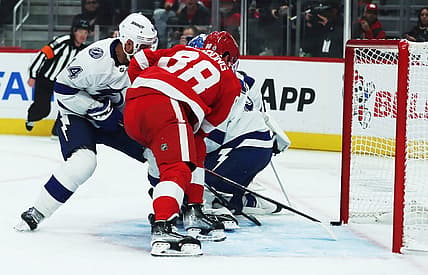 Oct 14, 2023; Detroit, Michigan, USA;  Detroit Red Wings right wing Daniel Sprong scores against Tampa Bay Lightning goaltender Jonas Johansson during first-period action on Saturday, Oct. 14, 2023, in Detroit, Michigan. Mandatory Credit: Kirthmon F. Dozier-USA TODAY Sports