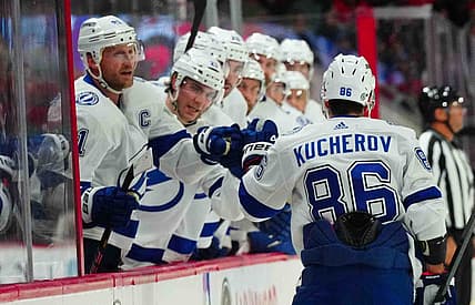 Nov 24, 2023; Raleigh, North Carolina, USA; Tampa Bay Lightning right wing Nikita Kucherov (86) celebrates his goal against the Carolina Hurricanes during the second period at PNC Arena. Mandatory Credit: James Guillory-USA TODAY Sports