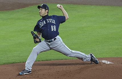 Apr 29, 2021; Houston, Texas, USA; Seattle Mariners starting pitcher Yusei Kikuchi (18) pitches against the Houston Astros in the first inning at Minute Maid Park. Mandatory Credit: Thomas Shea-USA TODAY Sports