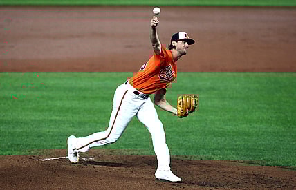 Sept. 25, 2021; Baltimore, Maryland, USA; Baltimore Orioles relief pitcher Chris Ellis (75) throws against the Texas Rangers during the third inning at Oriole Park at Camden Yards. Mandatory Credit: Daniel Kucin Jr.-USA TODAY Sports