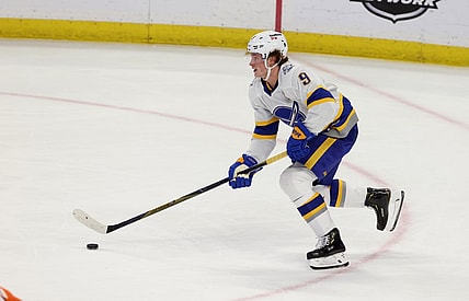 Feb 28, 2021; Buffalo, New York, USA; Buffalo Sabres center Jack Eichel (9) skates up the ice with the puck against the Philadelphia Flyers during the second period at KeyBank Center. Mandatory Credit: Timothy T. Ludwig-USA TODAY Sports