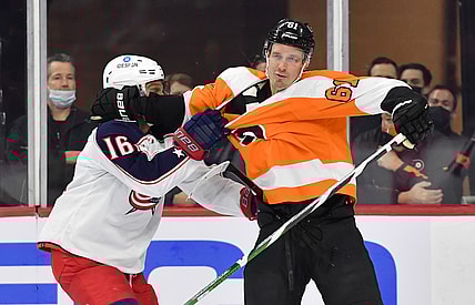 Jan 20, 2022; Philadelphia, Pennsylvania, USA; Columbus Blue Jackets center Max Domi (16) battles for the puck with Philadelphia Flyers defenseman Justin Braun (61) during the first period at Wells Fargo Center. Mandatory Credit: Eric Hartline-USA TODAY Sports