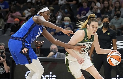 Aug 12, 2021; Phoenix, Arizona, USA; Seattle Storm forward Breanna Stewart (30) drives against Connecticut Sun forward Kaila Charles (left) in the first half during the Inaugural WNBA Commissioners Cup Championship Game at Footprint Center. Mandatory Credit: Rick Scuteri-USA TODAY Sports