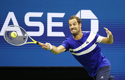 Aug 30, 2021; Flushing, NY, USA; Richard Gasquet of France returns a shot Daniil Medvedev of Russia in the first round on day one of the 2021 U.S. Open tennis tournament at USTA Billie King National Tennis Center. Mandatory Credit: Jerry Lai-USA TODAY Sports