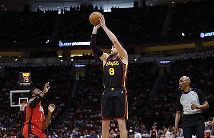 Apr 10, 2022; Houston, Texas, USA; Atlanta Hawks forward Danilo Gallinari (8) shoots the ball as Houston Rockets forward David Nwaba (2) defends during the fourth quarter at Toyota Center. Mandatory Credit: Troy Taormina-USA TODAY Sports