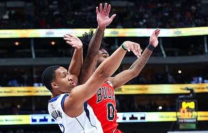 Nov 1, 2023; Dallas, Texas, USA;  Dallas Mavericks forward Grant Williams (3) shoots past Chicago Bulls guard Coby White (0) during the first quarter at American Airlines Center. Mandatory Credit: Kevin Jairaj-USA TODAY Sports